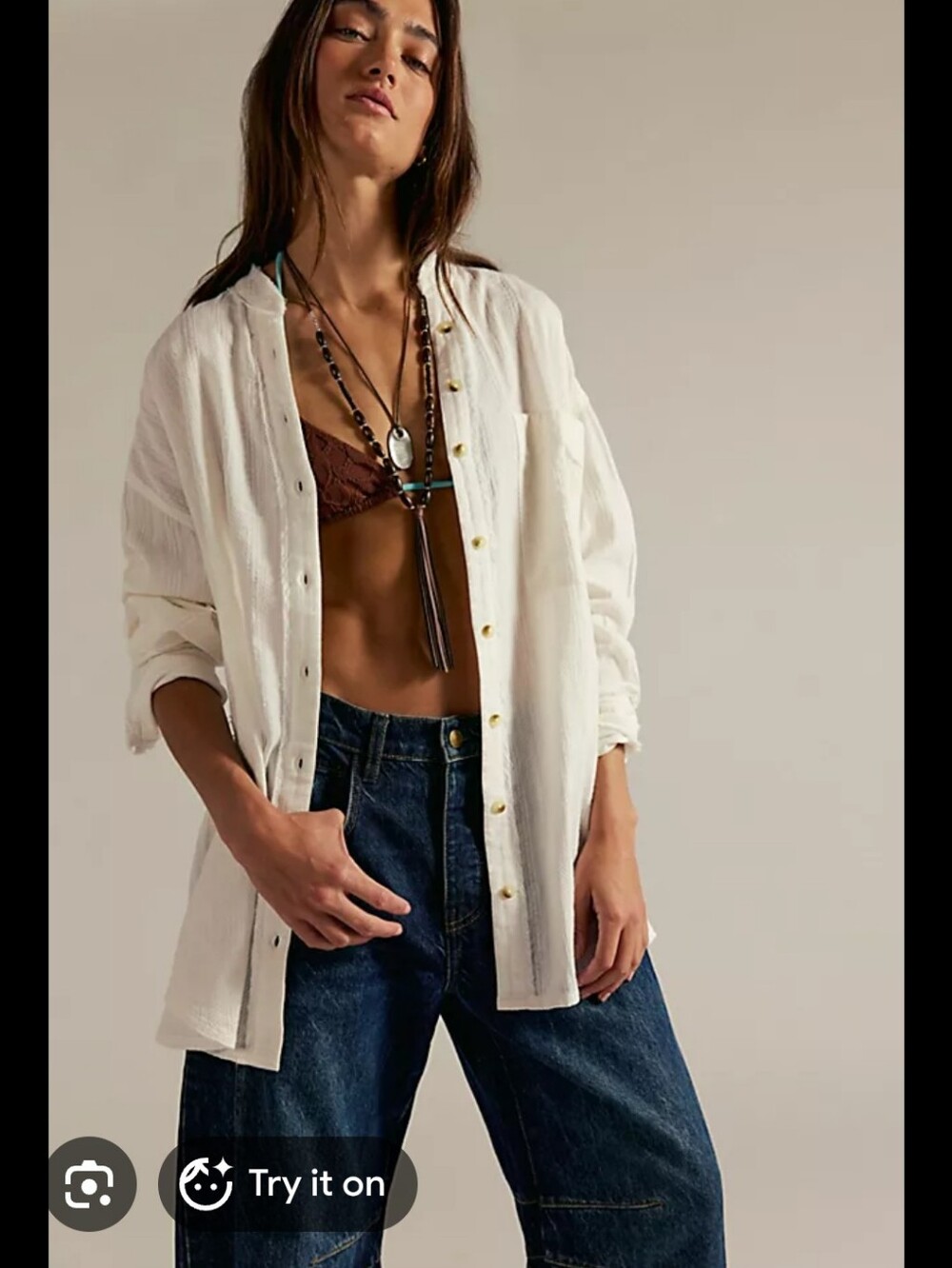 We The Free button-up shirt features a light yellow color